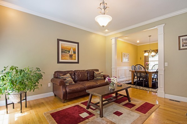 554 Douglas Road Northbridge, MA 01588 - Photo 12 of 30 a living room with furniture and wooden floor