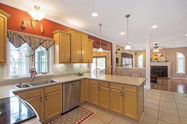 554 Douglas Road Northbridge, MA 01588 - Photo 14 of 30 a kitchen with a sink stove and cabinets