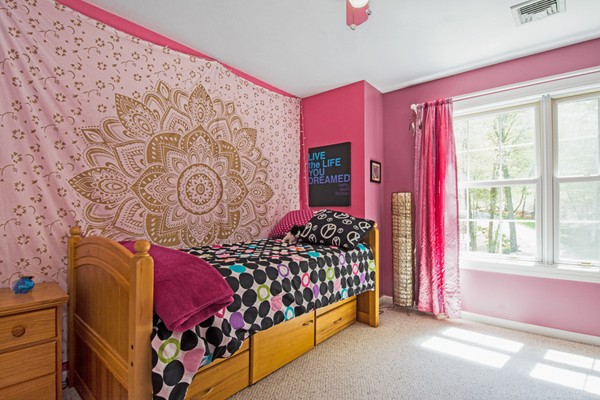554 Douglas Road Northbridge, MA 01588 - Photo 27 of 30 a bed room with a bed and a window