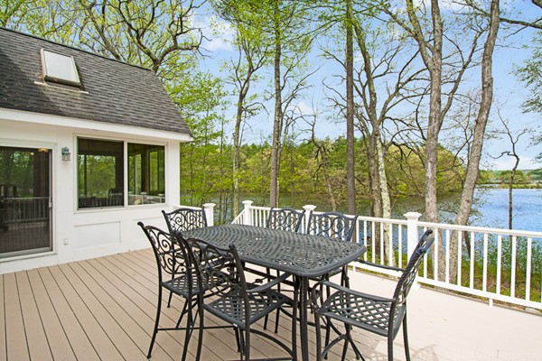 554 Douglas Road Northbridge, MA 01588 - Photo 10 of 30 a view of a patio with a table chairs and a backyard
