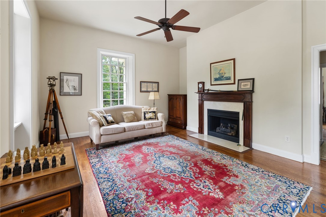 13173 Scotchtown Road Beaverdam, VA 23015 - Photo 18 of 65 a living room with furniture and a fireplace