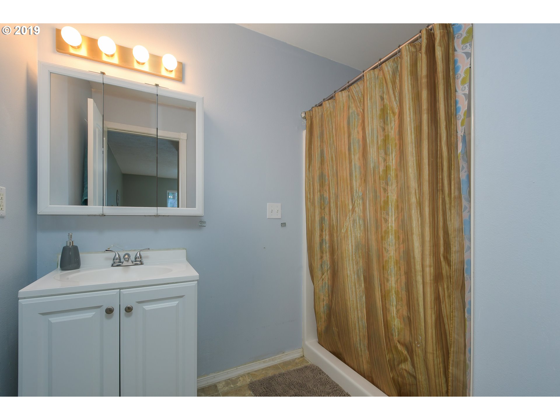 65210 East Alpine Way Rhododendron, OR 97049 - Photo 18 of 29 a bathroom with a sink and a mirror