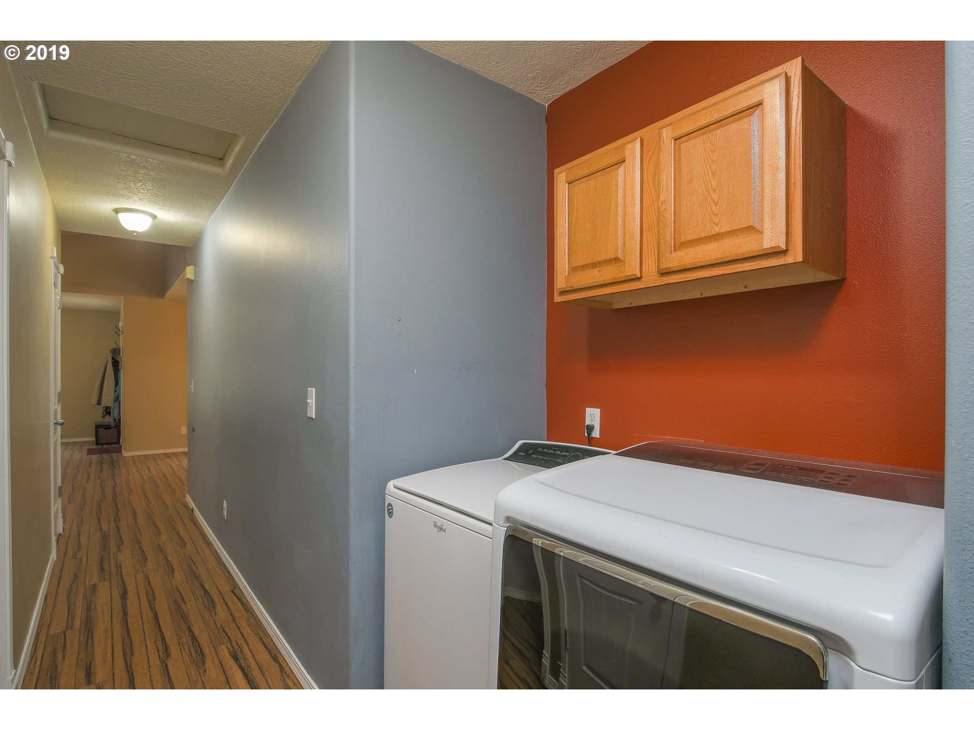 65210 East Alpine Way Rhododendron, OR 97049 - Photo 19 of 29 a view of hallway with washer and dryer