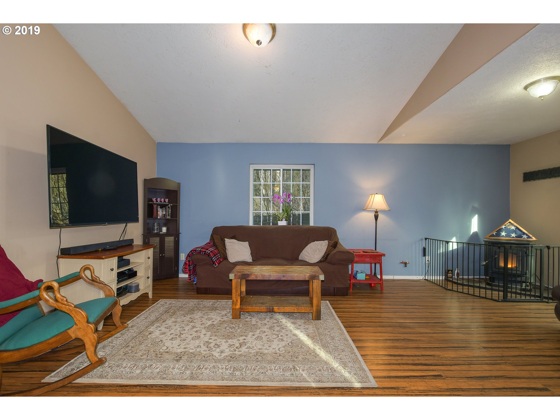65210 East Alpine Way Rhododendron, OR 97049 - Photo 5 of 29 a living room with furniture and a flat screen tv