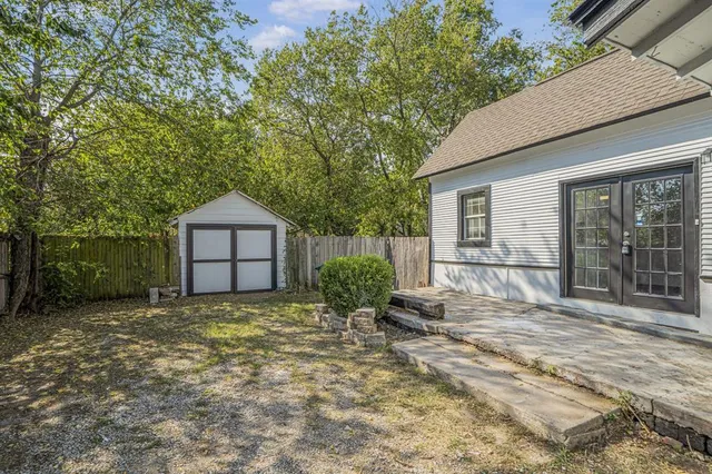 a house view with a outdoor space
