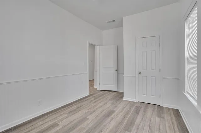 a view of small space with wooden floor