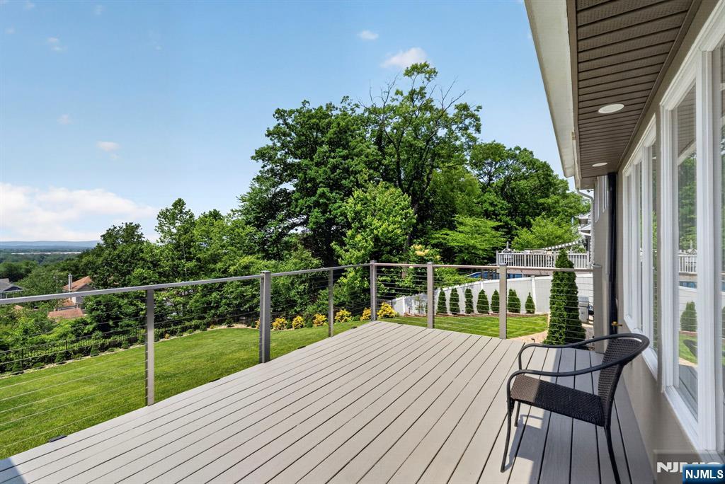 57 Hemlock Road Little Falls, NJ 07424 - Photo 41 of 50 a view of balcony with deck and wooden floor