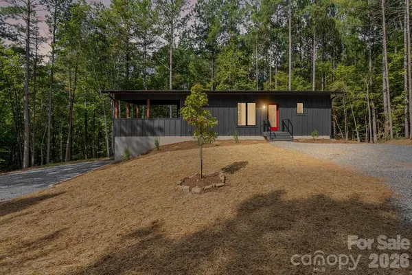 a house with trees in the background