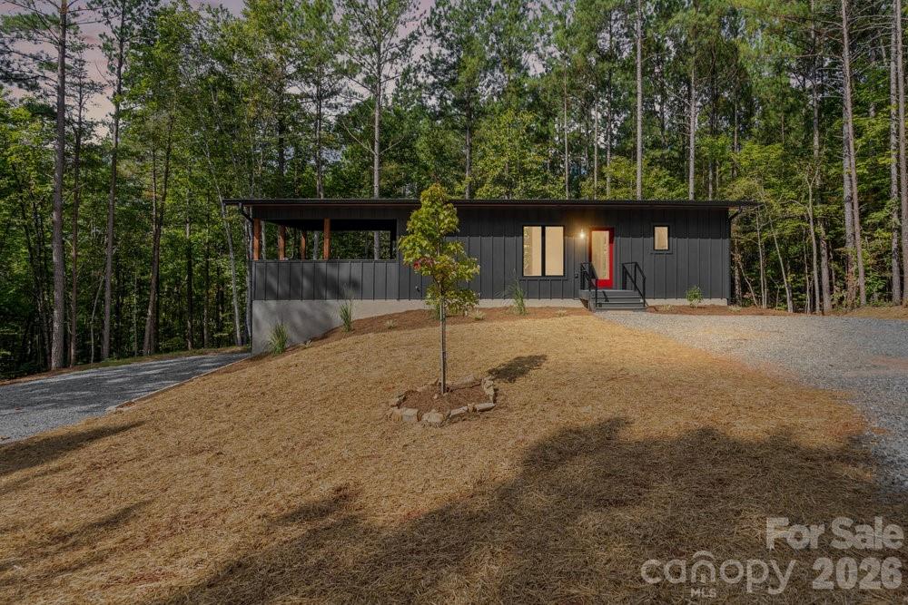 a house with trees in the background