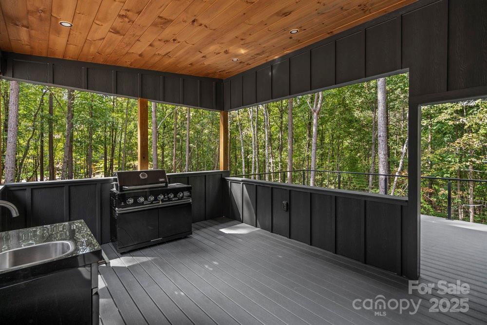 203 Golden Crk Ridge Union Mills, NC 28167 - Photo 11 of 47 a living room with furniture and a flat screen tv