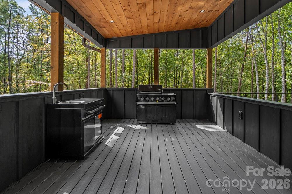 203 Golden Crk Ridge Union Mills, NC 28167 - Photo 12 of 47 a kitchen view with wooden floor