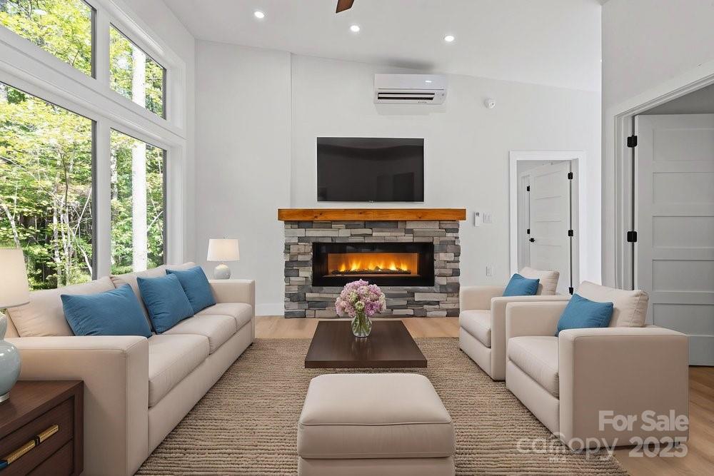 203 Golden Crk Ridge Union Mills, NC 28167 - Photo 23 of 47 a living room with furniture and a fireplace