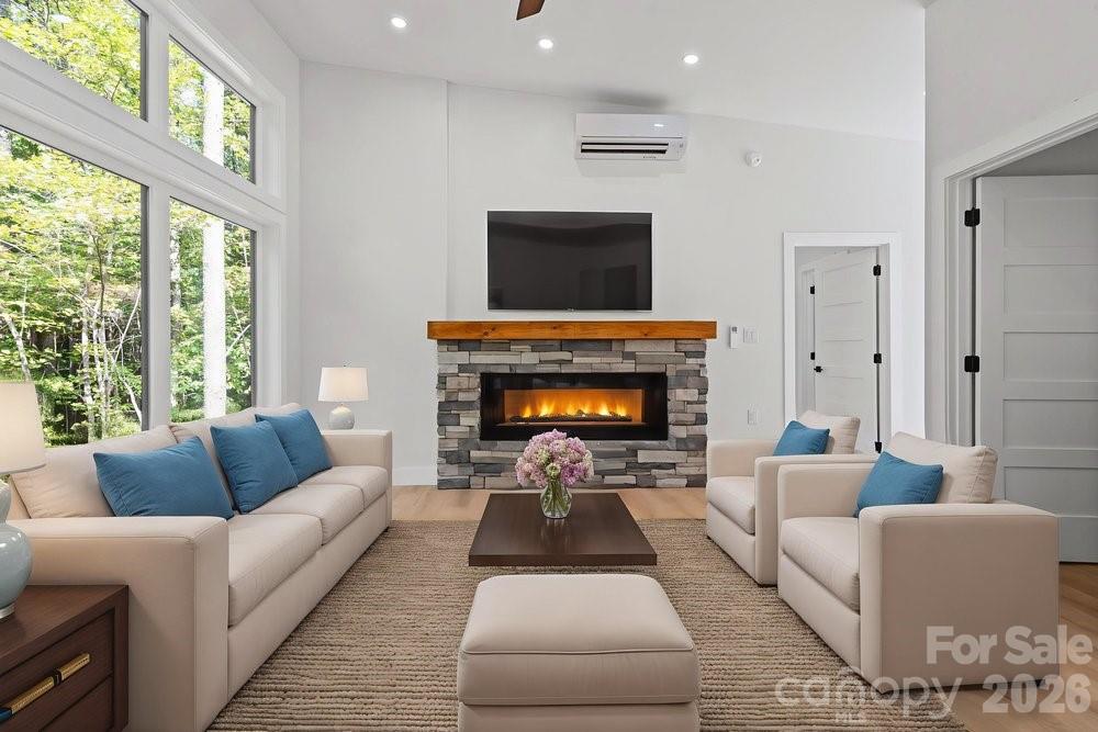 203 Golden Crk Ridge Union Mills, NC 28167 - Photo 23 of 47 a living room with furniture and a fireplace