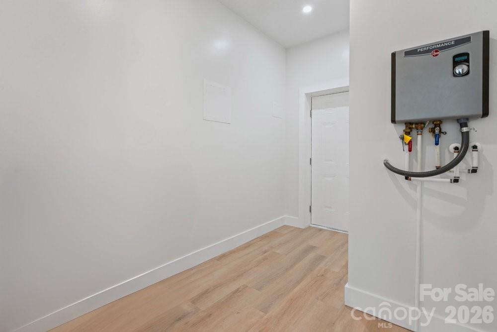 203 Golden Crk Ridge Union Mills, NC 28167 - Photo 37 of 47 a view of a room with rack on the wall