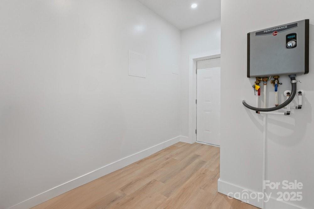 203 Golden Crk Ridge Union Mills, NC 28167 - Photo 37 of 47 a view of a room with rack on the wall