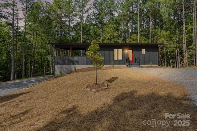 a house with trees in the background