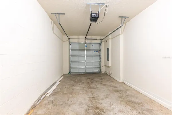 a view of empty room with stairs