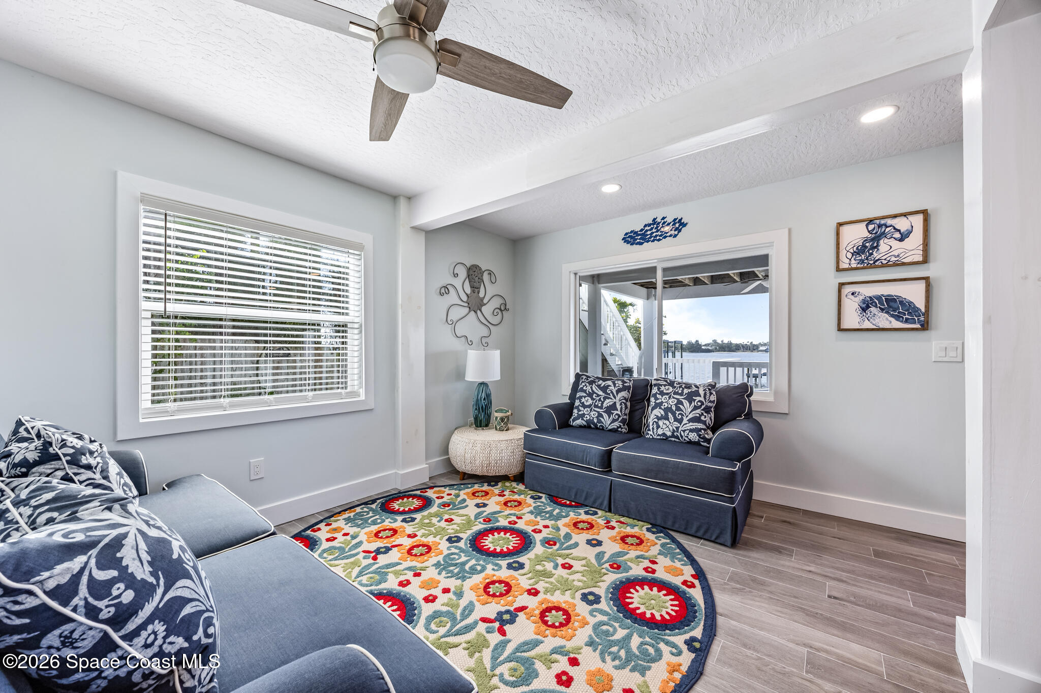 25 Vip Island, Unit A Grant, FL 32949 - Photo 25 of 56 a bedroom with furniture and windows