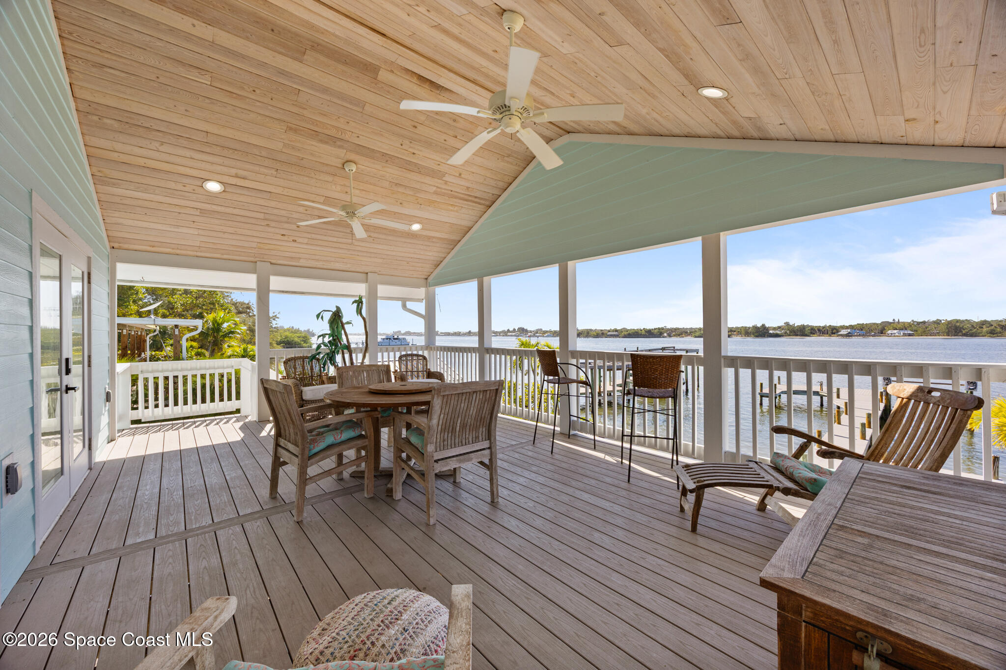 25 Vip Island, Unit A Grant, FL 32949 - Photo 34 of 56 a dining room with furniture and wooden floor