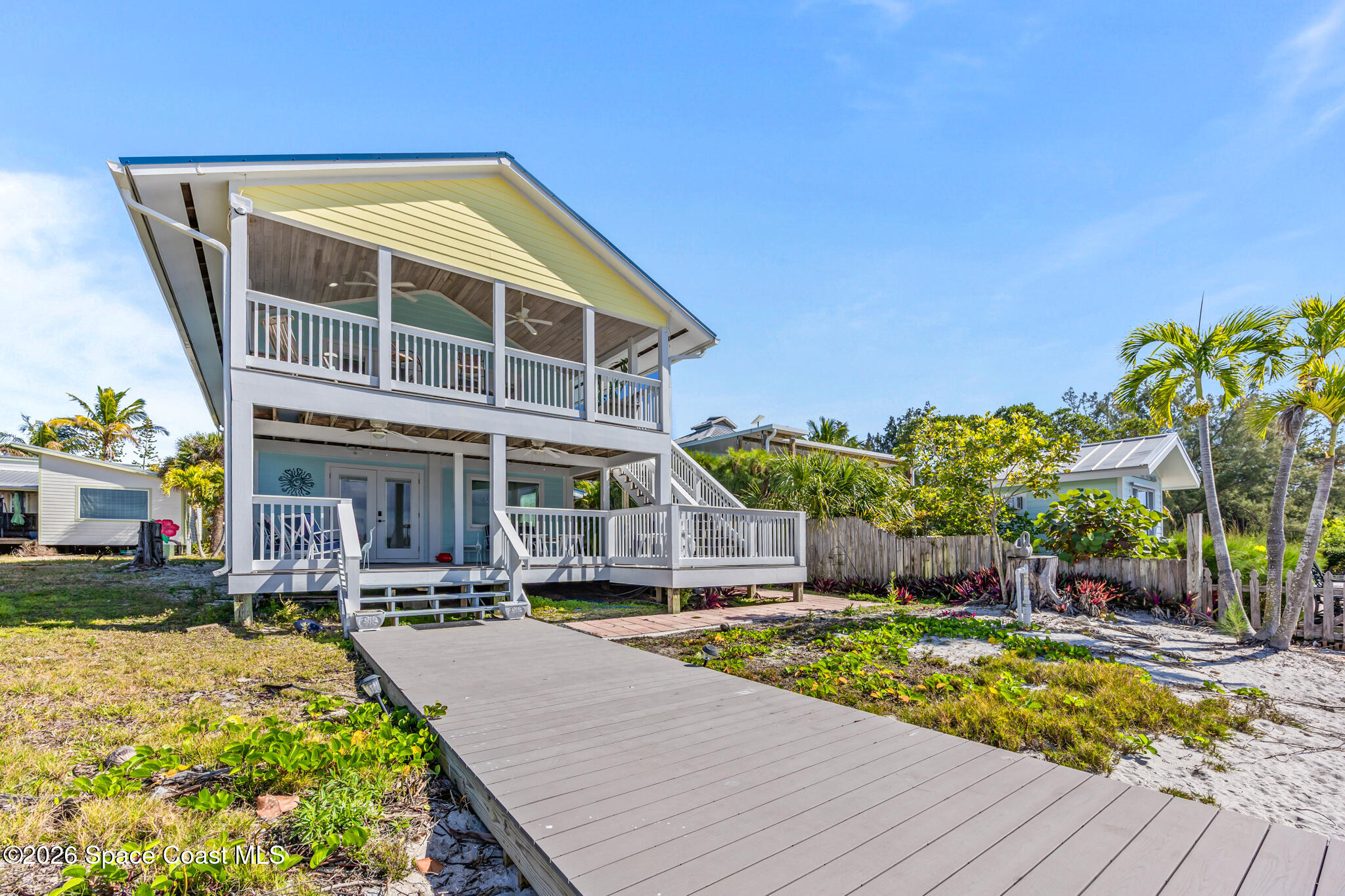 25 Vip Island, Unit A Grant, FL 32949 - Photo 38 of 56 a view of building with outdoor space and swimming pool