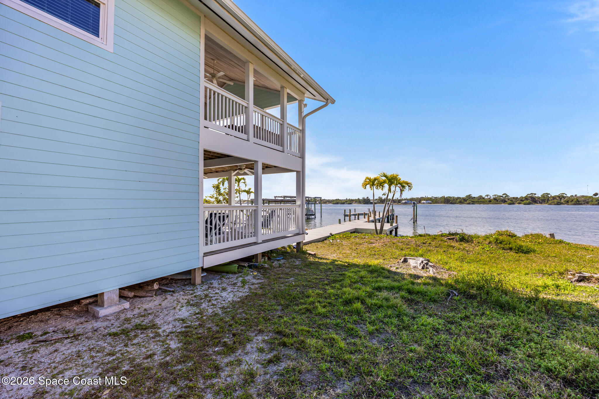 25 Vip Island, Unit A Grant, FL 32949 - Photo 44 of 56 a house with swimming pool in front of it