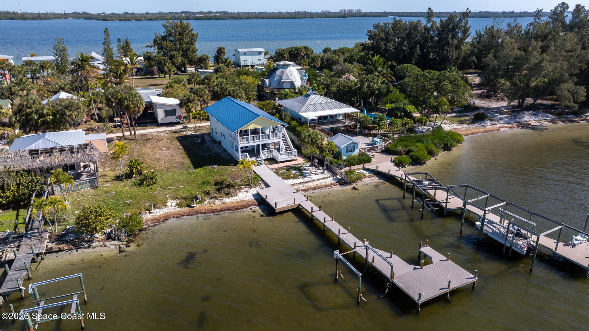 25 Vip Island, Unit A Grant, FL 32949 - Photo 56 of 56 an aerial view of a house with a lake view