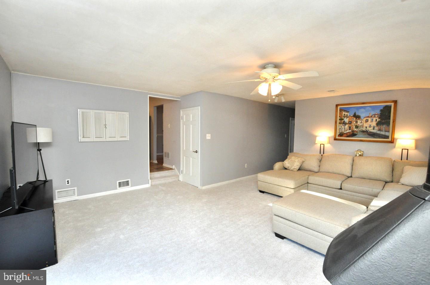 10 Blatherwick Drive Berlin, NJ 08009 - Photo 15 of 38 a living room with furniture and a ceiling fan