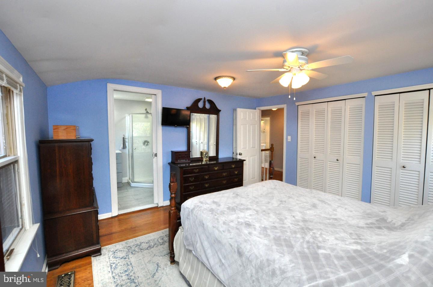 10 Blatherwick Drive Berlin, NJ 08009 - Photo 22 of 38 a large bedroom with a bed and wooden floor