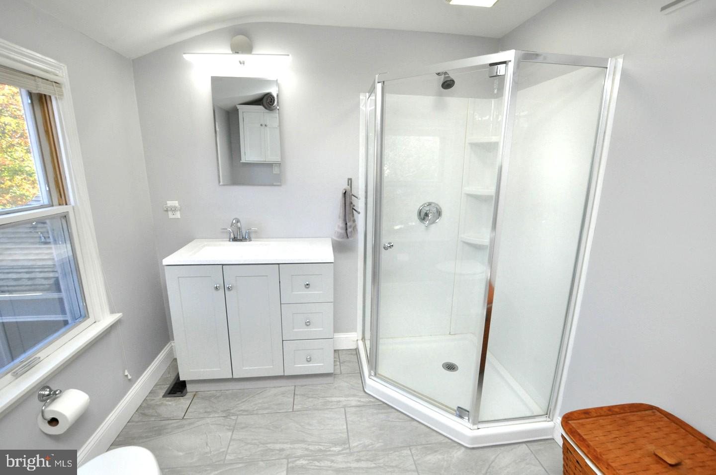 10 Blatherwick Drive Berlin, NJ 08009 - Photo 23 of 38 a bathroom with a shower sink and mirror