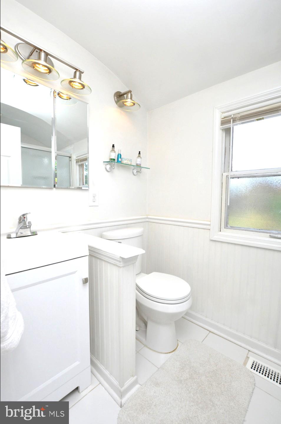 10 Blatherwick Drive Berlin, NJ 08009 - Photo 27 of 38 a bathroom with a sink a toilet and a mirror