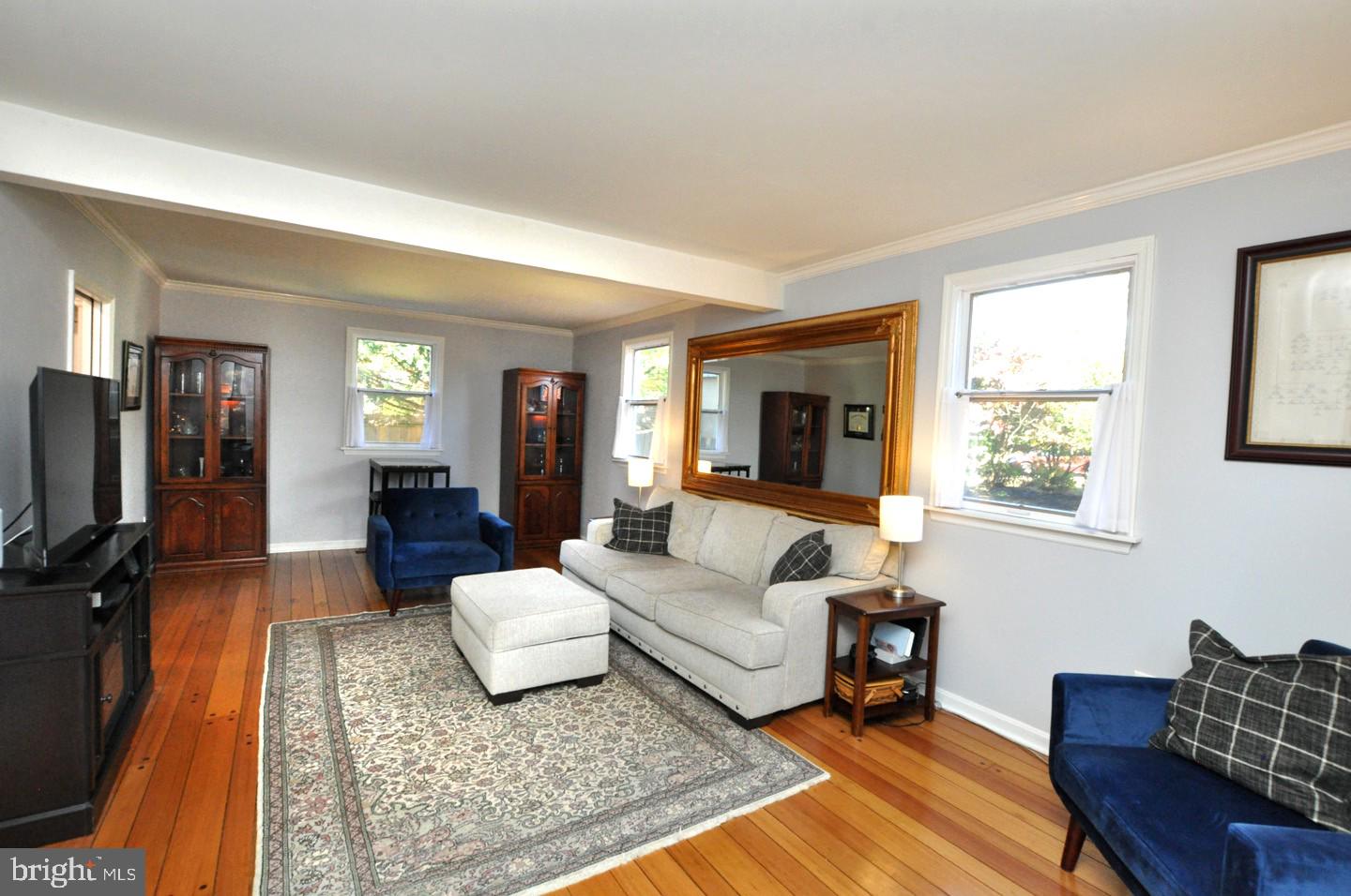 10 Blatherwick Drive Berlin, NJ 08009 - Photo 3 of 38 a living room with furniture and a flat screen tv