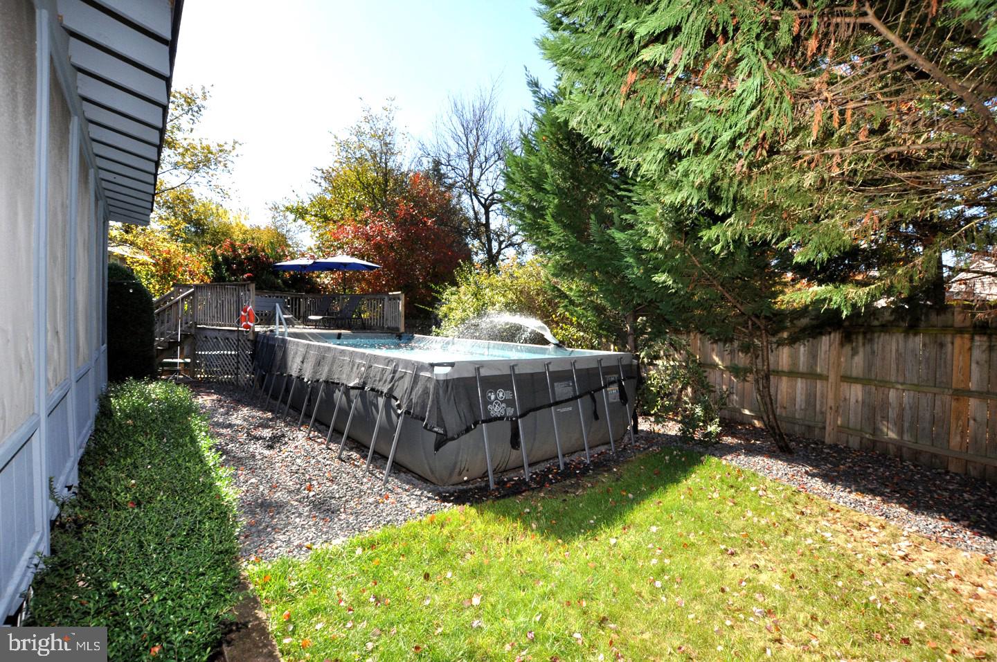 10 Blatherwick Drive Berlin, NJ 08009 - Photo 32 of 38 a view of a backyard with wooden fence