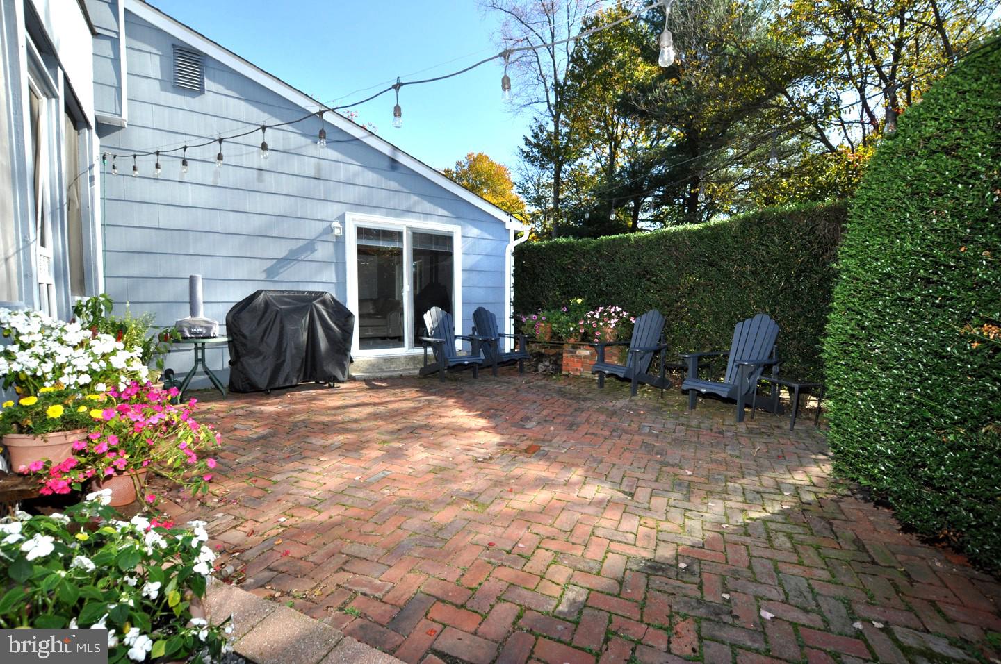 10 Blatherwick Drive Berlin, NJ 08009 - Photo 33 of 38 a view of a chair and table in the backyard of the house