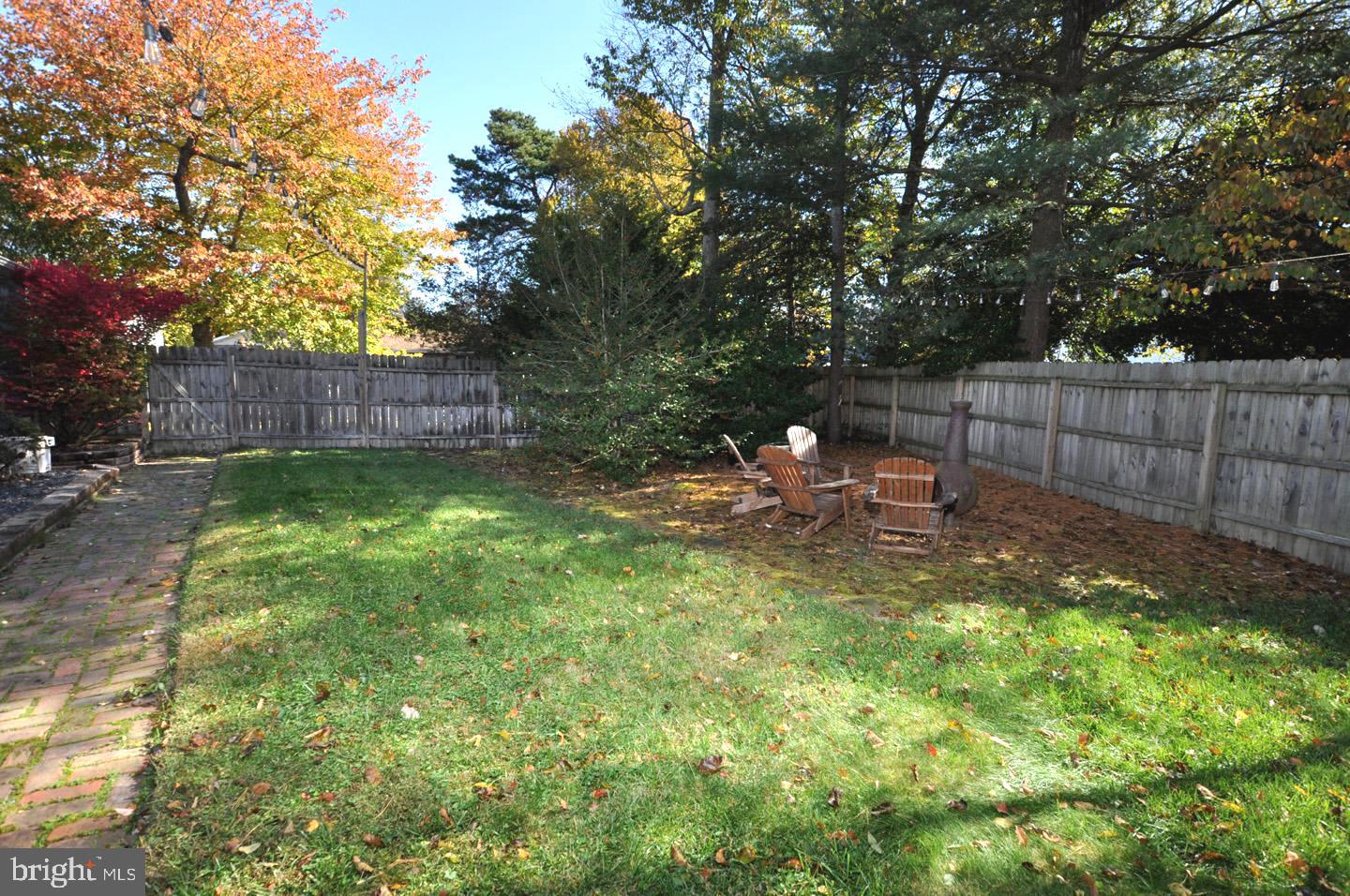 10 Blatherwick Drive Berlin, NJ 08009 - Photo 36 of 38 a backyard of a house with table and chairs