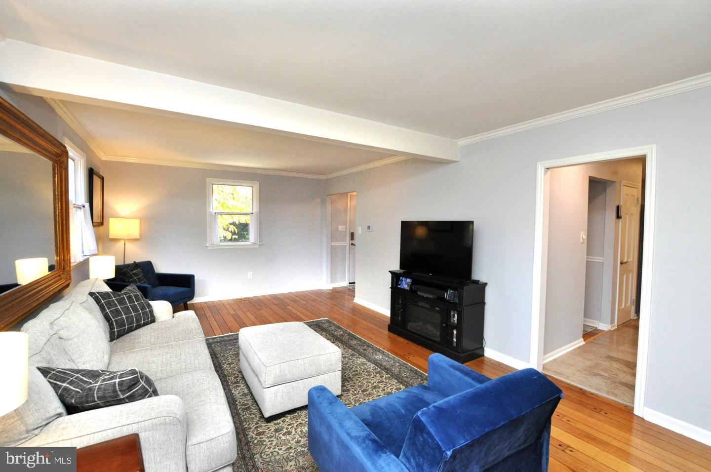 10 Blatherwick Drive Berlin, NJ 08009 - Photo 4 of 38 a living room with furniture and a flat screen tv