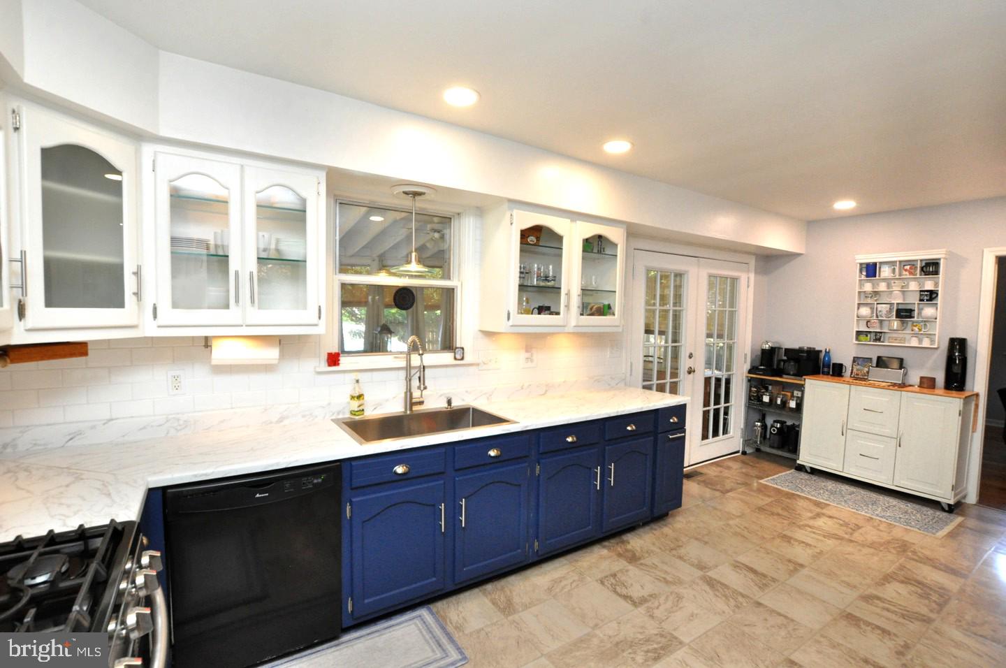 10 Blatherwick Drive Berlin, NJ 08009 - Photo 10 of 38 a kitchen with a sink stove and cabinets