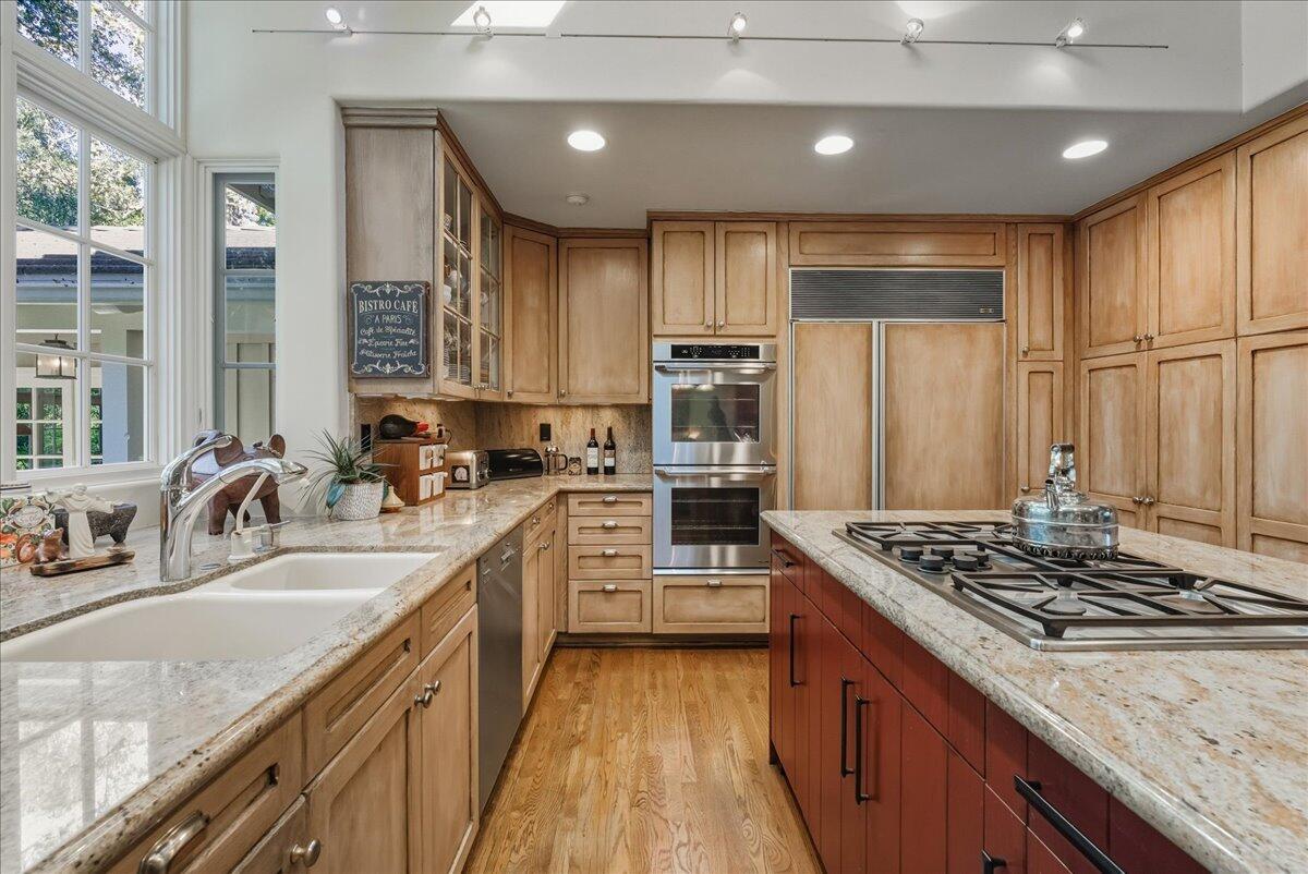 2140 Veloz Drive Montecito, CA 93108 - Photo 17 of 50 a kitchen with stainless steel appliances granite countertop a sink stove and refrigerator