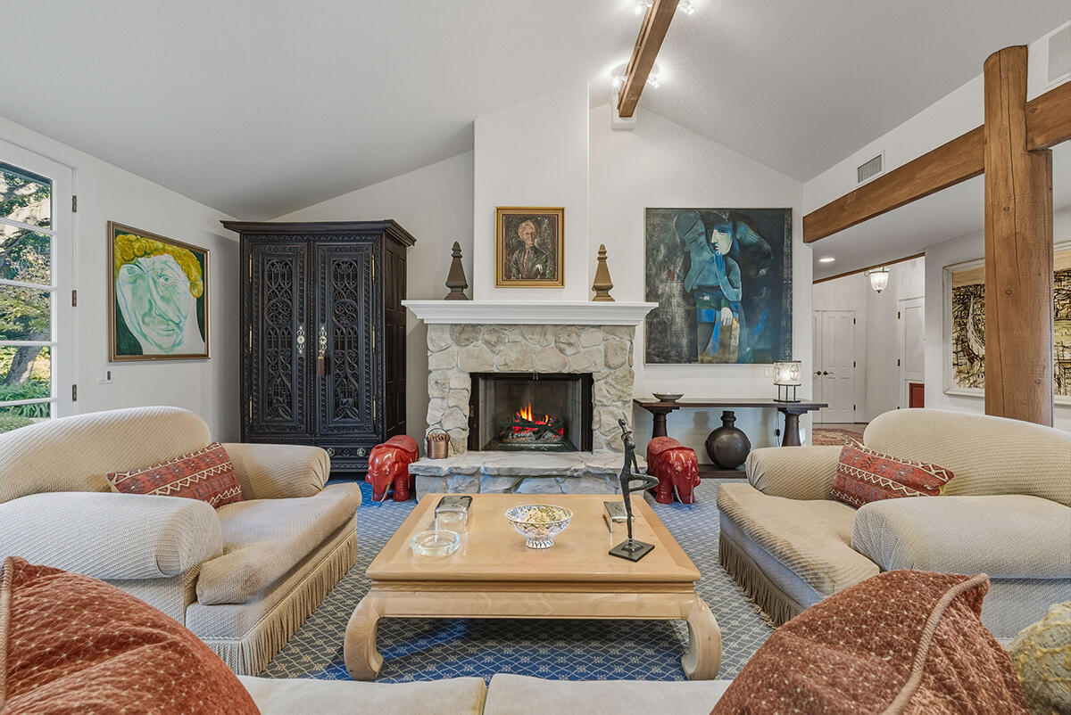 2140 Veloz Drive Montecito, CA 93108 - Photo 20 of 50 a living room with furniture and a fireplace
