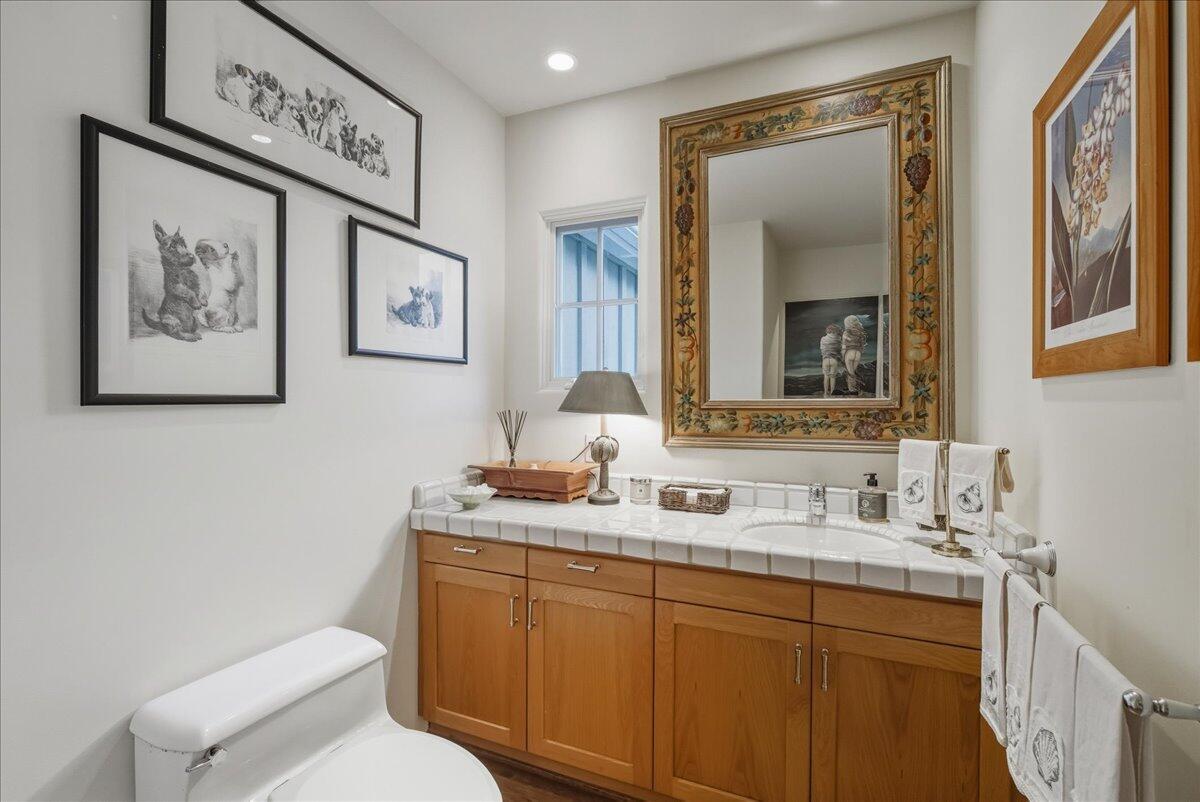 2140 Veloz Drive Montecito, CA 93108 - Photo 37 of 50 a bathroom with a toilet sink and mirror