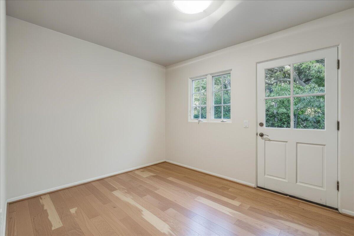 2140 Veloz Drive Montecito, CA 93108 - Photo 39 of 50 an empty room with wooden floor and windows