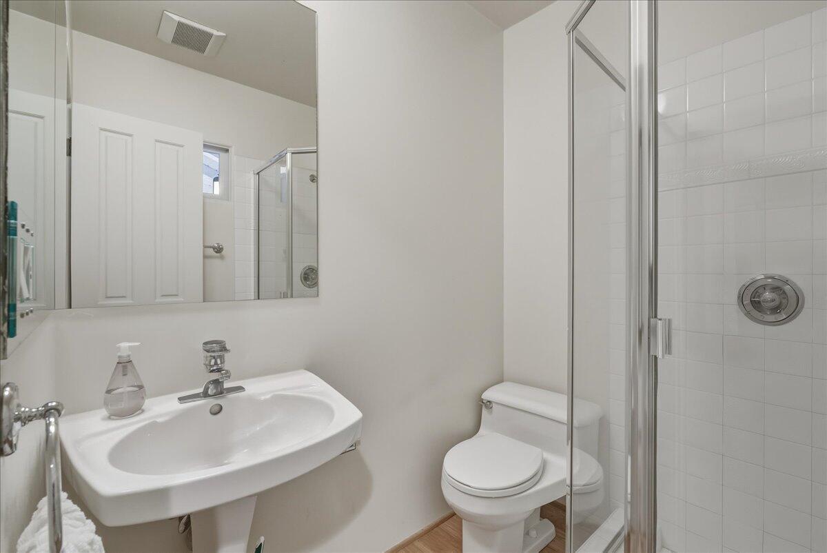 2140 Veloz Drive Montecito, CA 93108 - Photo 41 of 50 a bathroom with a sink toilet and a mirror