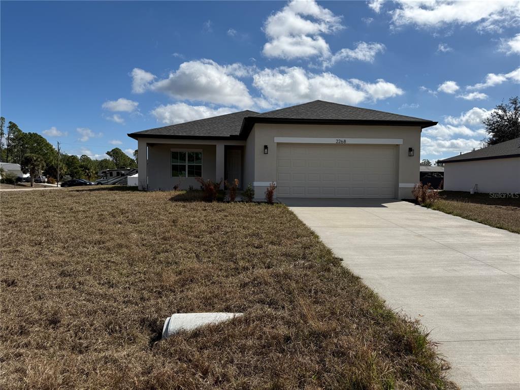 a view of a house with a patio