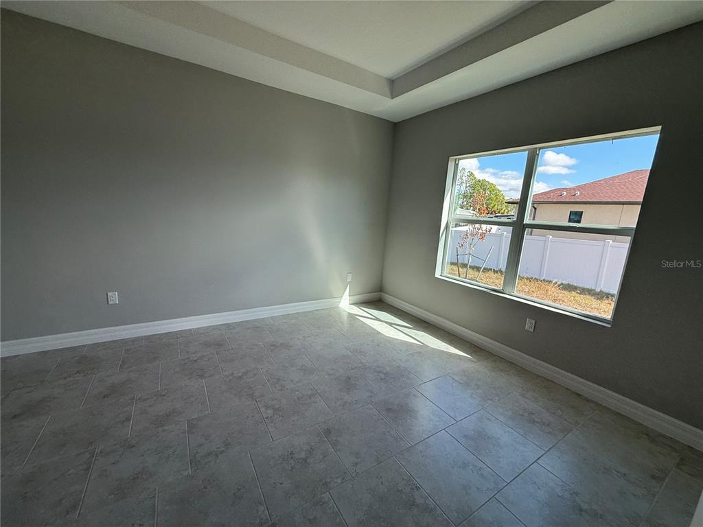 2268 Brewster Road North Port, FL 34288 - Photo 12 of 33 a view of an empty room with a window
