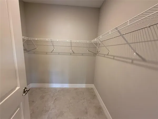 a view of a room with racks on the wall