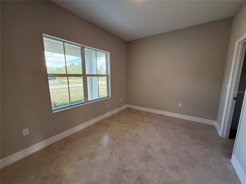 2268 Brewster Road North Port, FL 34288 - Photo 19 of 33 an empty room with a window