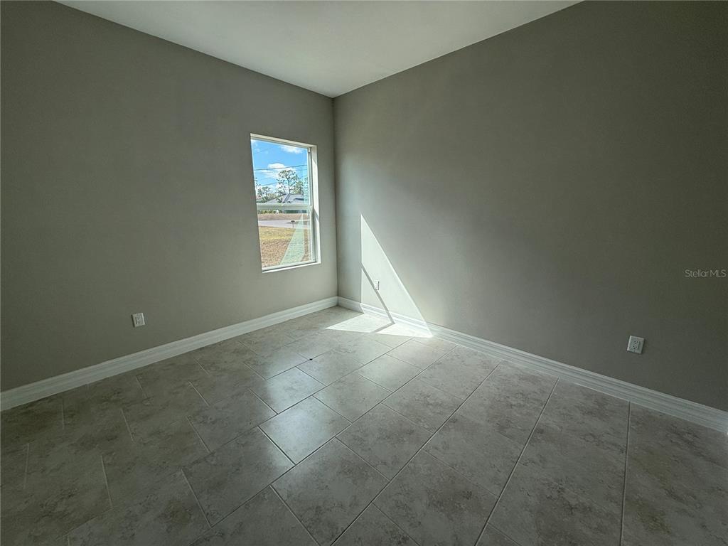 2268 Brewster Road North Port, FL 34288 - Photo 22 of 33 an empty room with windows