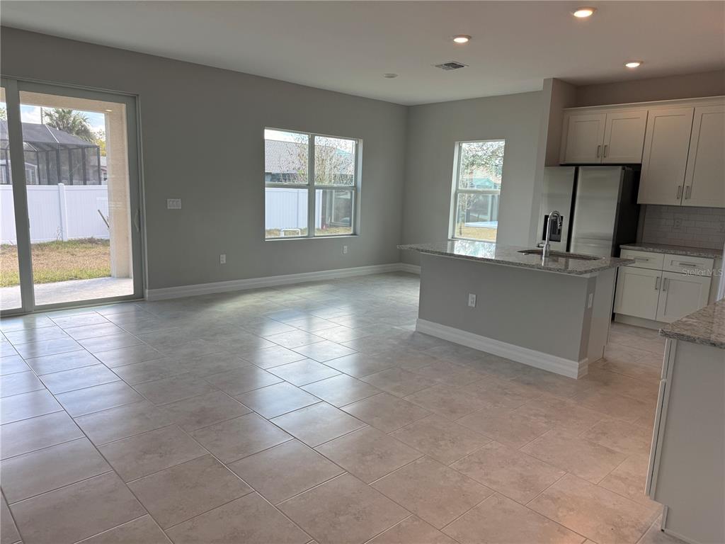 2268 Brewster Road North Port, FL 34288 - Photo 4 of 33 a view of a kitchen with a sink and a window