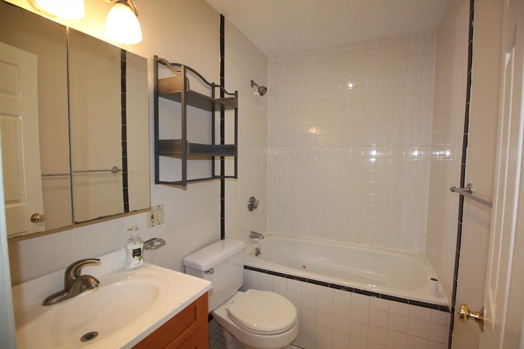 11 Worcester Street, Unit 2 Boston, MA 02118 - Photo 17 of 23 a bathroom with a sink toilet and shower