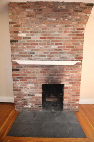 a living room with a fireplace