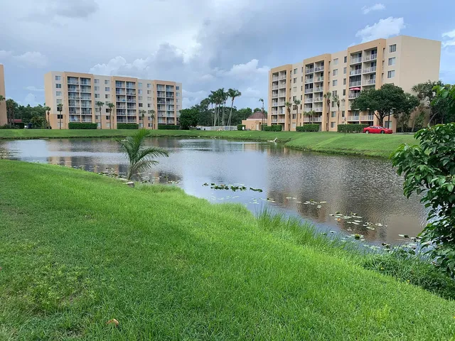 a view of a lake with building in front of it